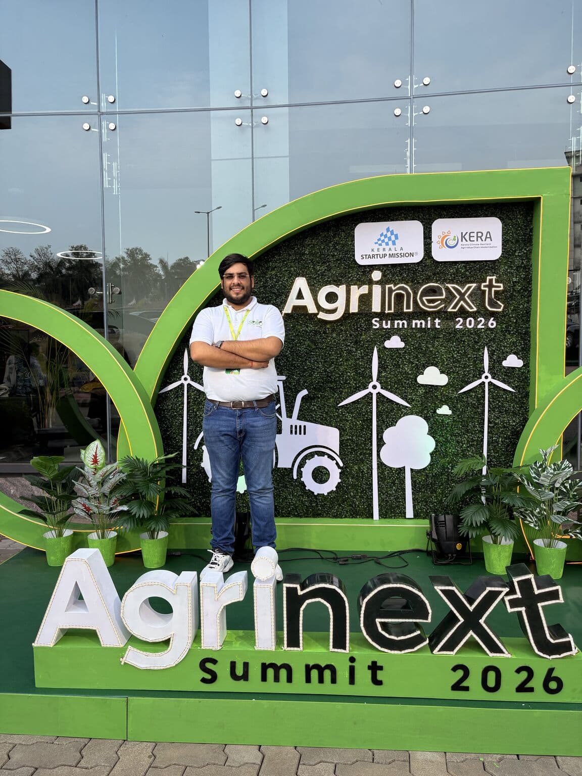 Participant at the Agrinext Summit 2026 display with Kerala Startup Mission and KERA signage