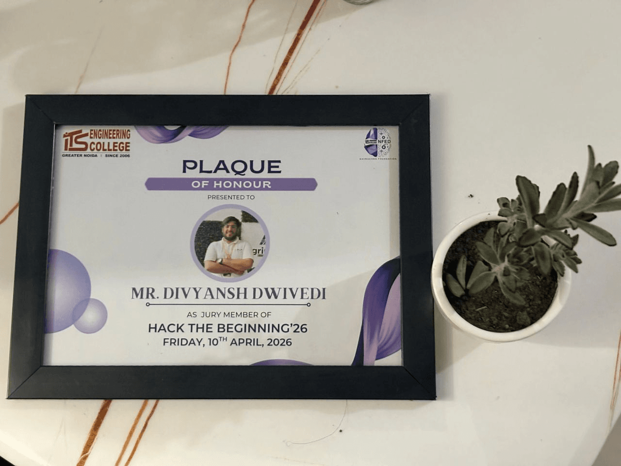 Plaque of honour presented to Divyansh Dwivedi as a jury member of Hack The Beginning’26
